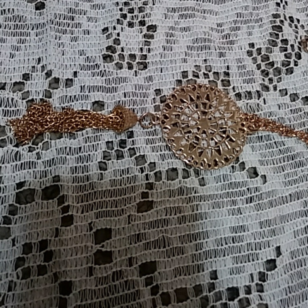 Gold colored necklace chain